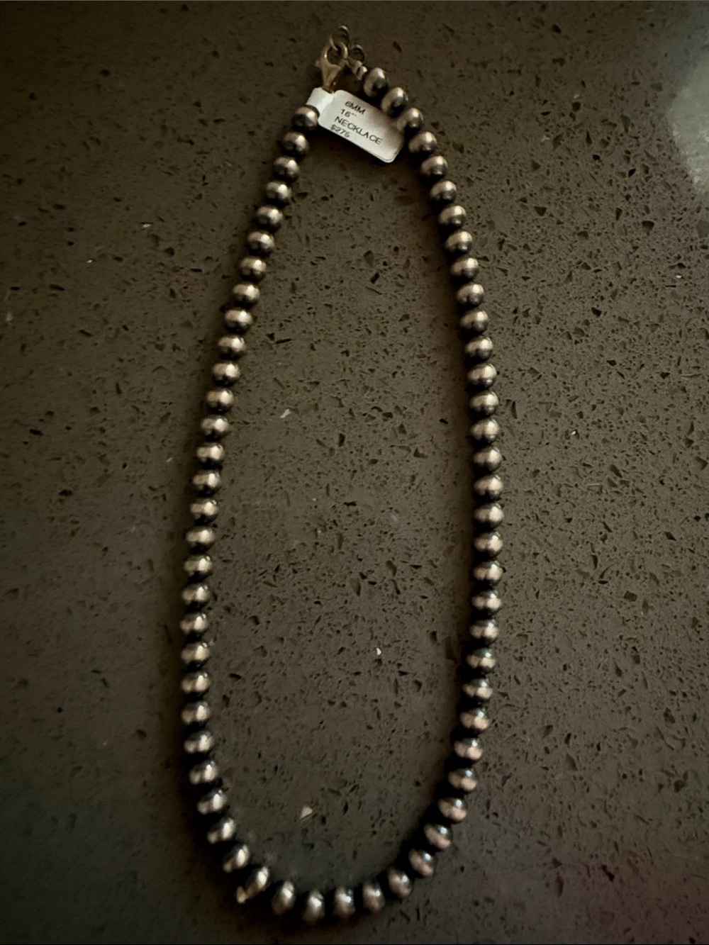 Hand strung sterling silver pearls